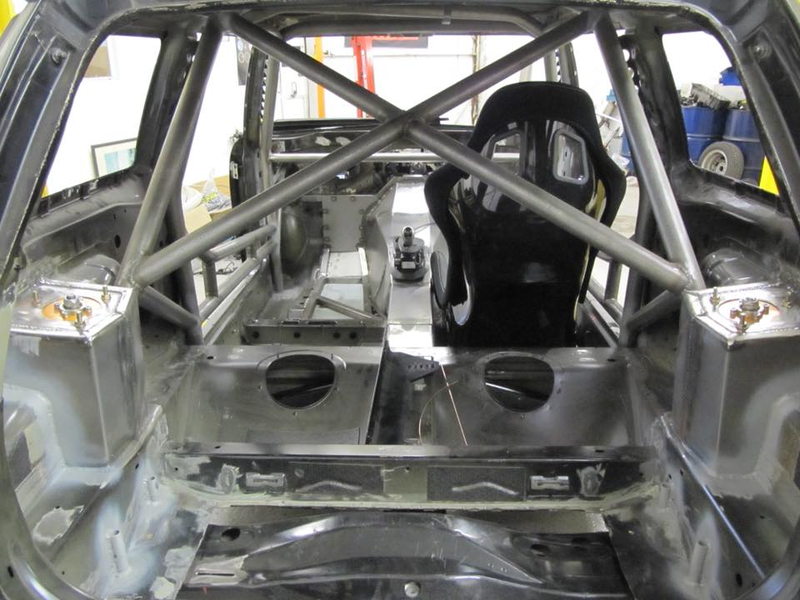 Illustration for article titled These Wonderful Madmen Stuffed A BMW V8 Into The Front Of A Mini